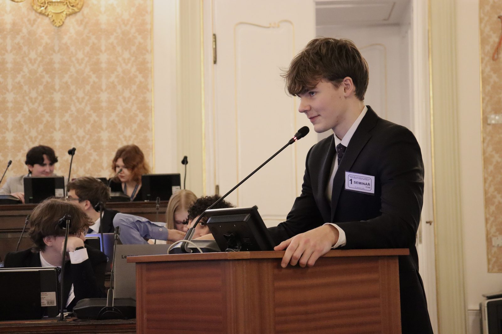 A delegate speaking at DUMUN26